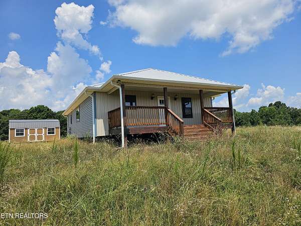 9.74 Acres of Residential Land with Home for Sale in Spring City, Tennessee