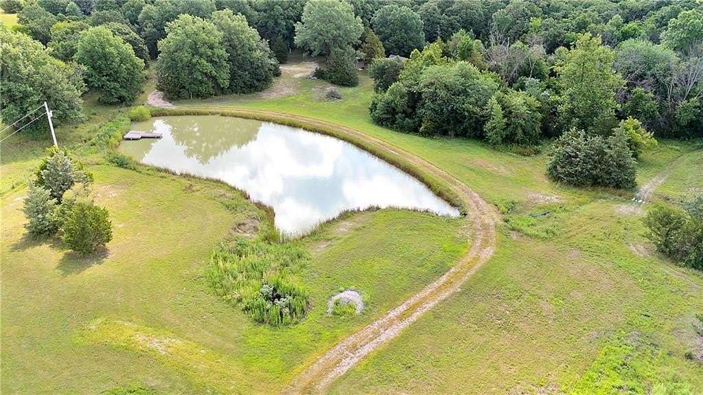 9.8 Acres of Residential Land with Home for Sale in Higginsville, Missouri