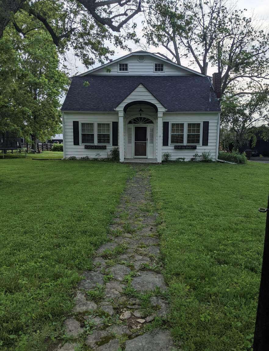 59.8 Acres of Agricultural Land with Home for Sale in Paris, Kentucky