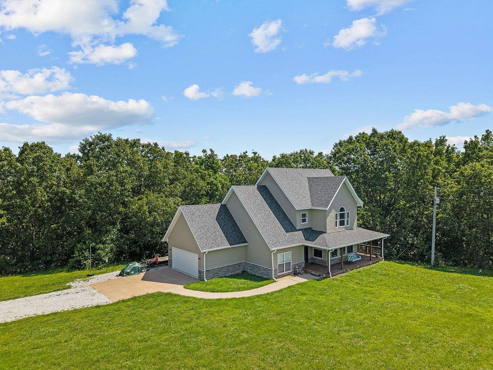 5.17 Acres of Residential Land with Home for Sale in Highlandville, Missouri