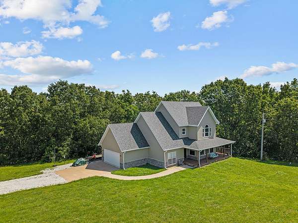 5.17 Acres of Residential Land with Home for Sale in Highlandville, Missouri