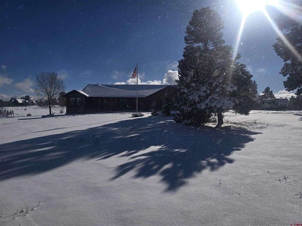 3.42 Acres of Residential Land with Home for Sale in Pagosa Springs, Colorado