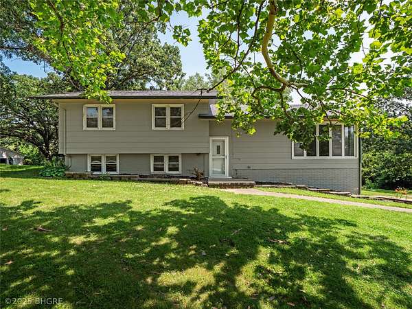 1.67 Acres of Residential Land with Home for Sale in Knoxville, Iowa