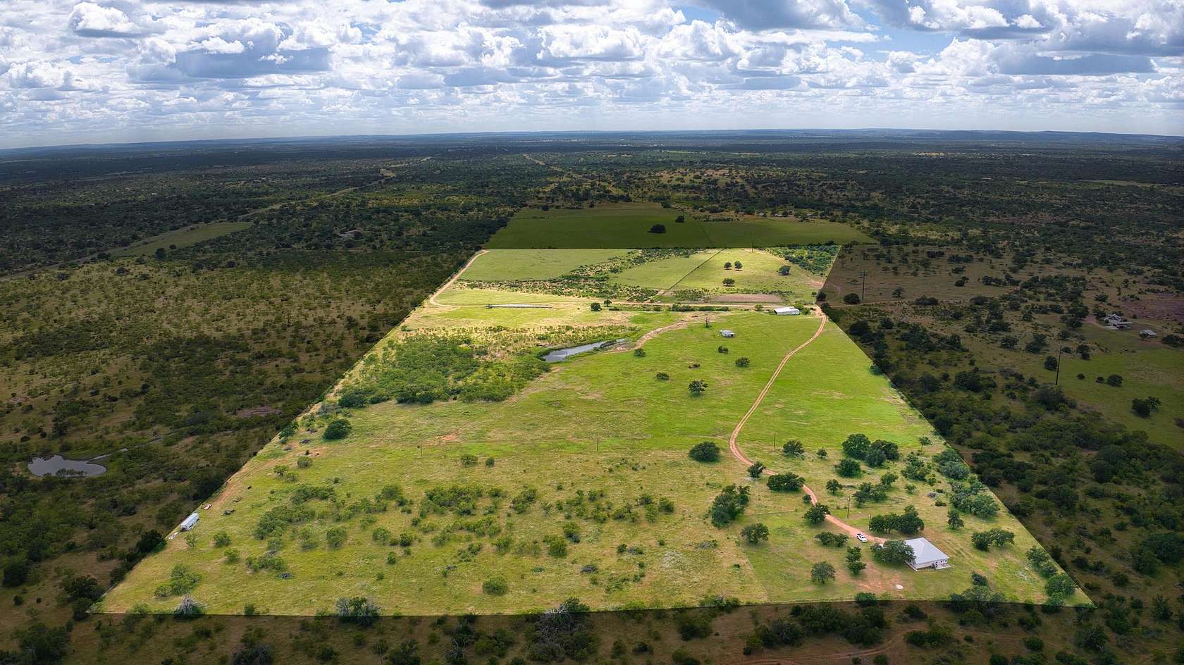 95.7 Acres of Land with Home for Sale in Llano, Texas