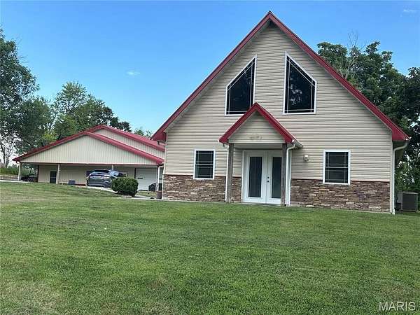 1.67 Acres of Residential Land with Home for Sale in Hannibal, Missouri