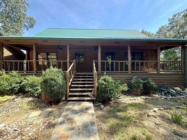 7 Acres of Residential Land with Home for Sale in Mountain View, Arkansas