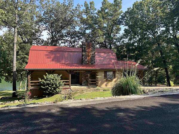 1.75 Acres of Residential Land with Home for Sale in Cherokee Village, Arkansas