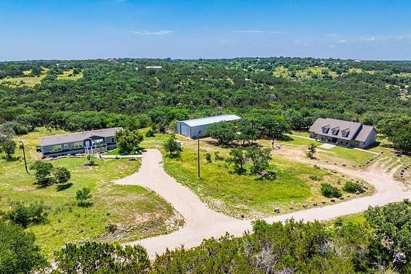 21.3 Acres of Agricultural Land with Home for Sale in Kerrville, Texas