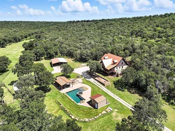 30 Acres of Agricultural Land with Home for Sale in Millsap, Texas