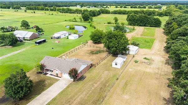 3 Acres of Residential Land with Home for Sale in Greenville, Texas