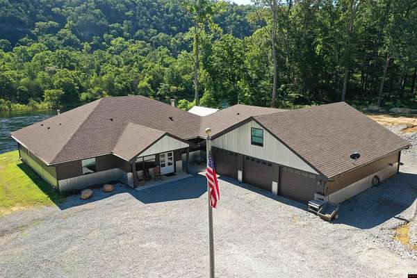 1.56 Acres of Land with Home for Sale in Flippin, Arkansas