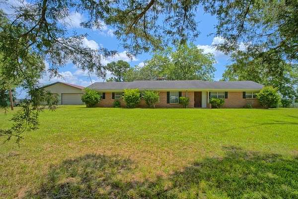 88.8 Acres of Agricultural Land with Home for Sale in Milam, Texas