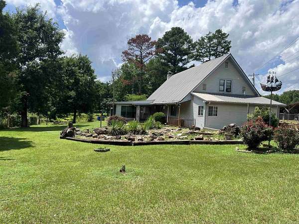 10.3 Acres of Land with Home for Sale in De Queen, Arkansas