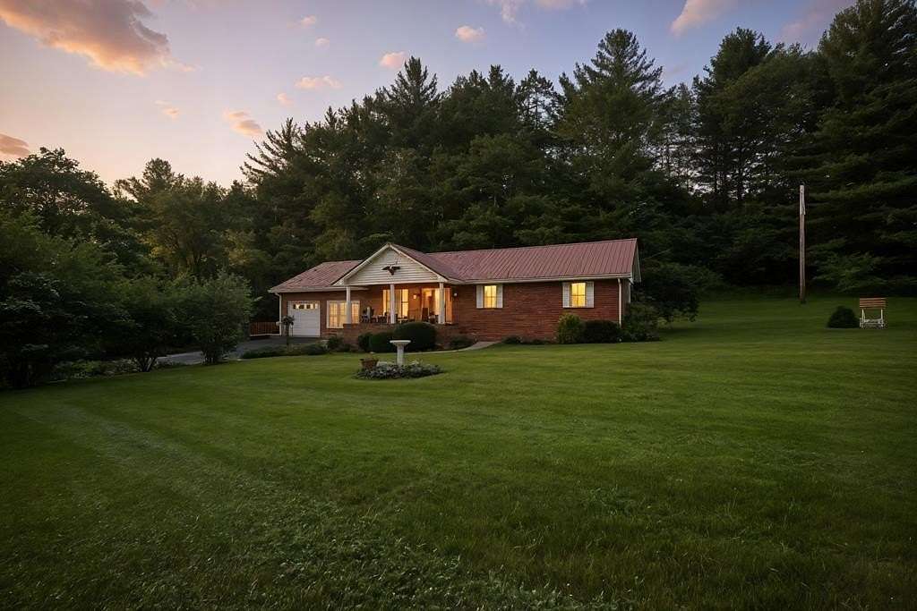 7 Acres of Residential Land with Home for Sale in Mountain City, Tennessee