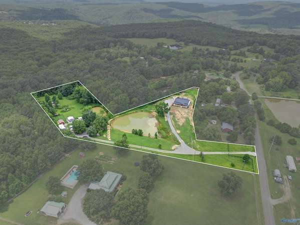 5.88 Acres of Land with Home for Sale in Eva, Alabama