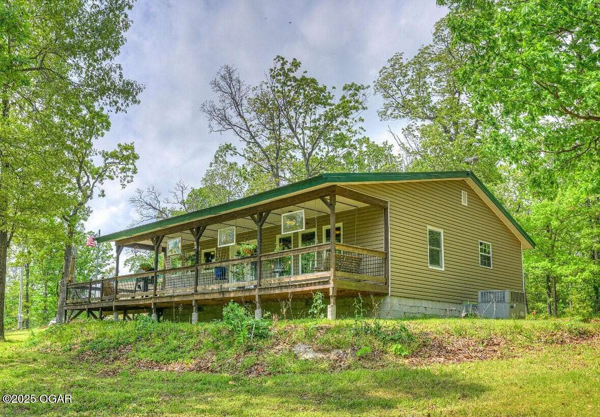 15 Acres of Land with Home for Sale in Wyandotte, Oklahoma