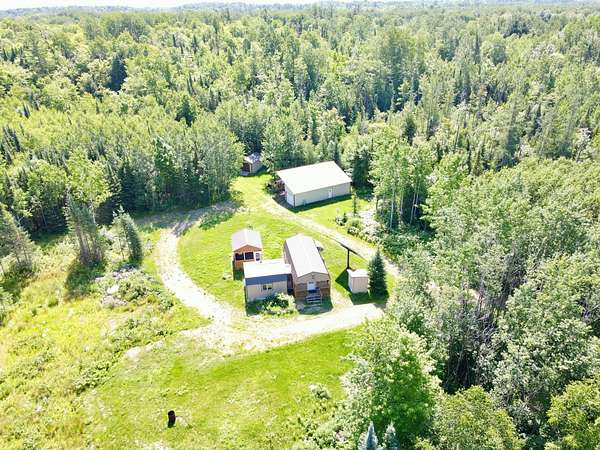 15 Acres of Recreational Land with Home for Sale in Tomahawk, Wisconsin