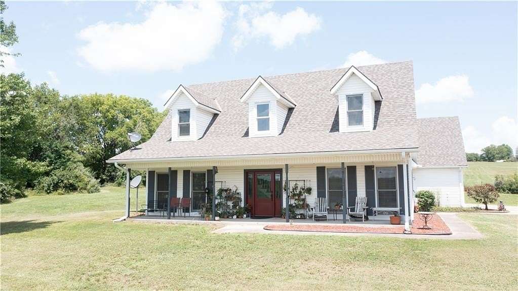 10 Acres of Land with Home for Sale in Oak Grove, Missouri