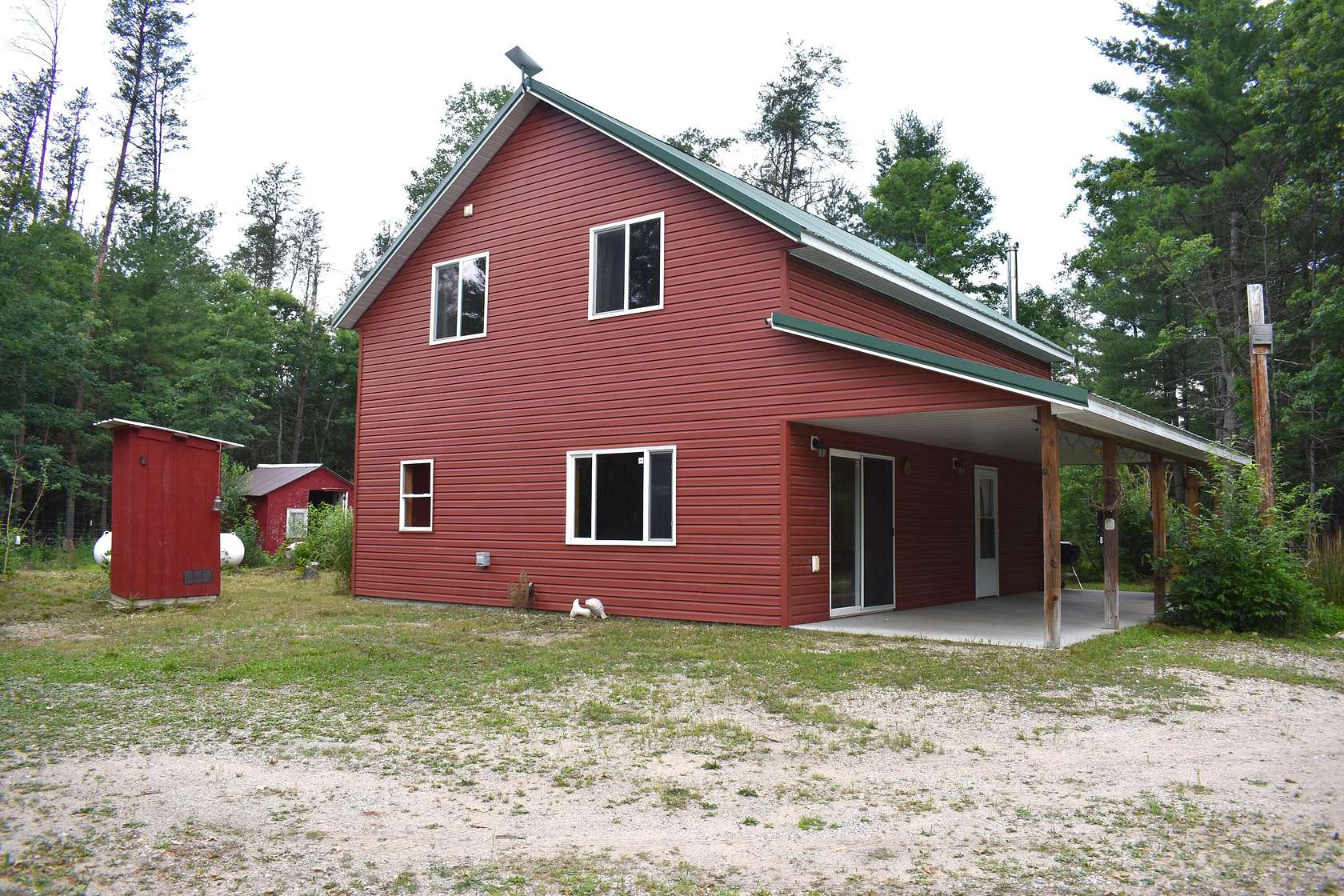 5 Acres of Residential Land with Home for Sale in Baldwin, Michigan