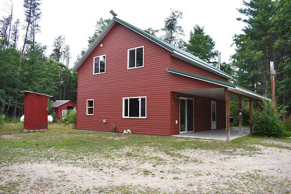 5 Acres of Residential Land with Home for Sale in Baldwin, Michigan