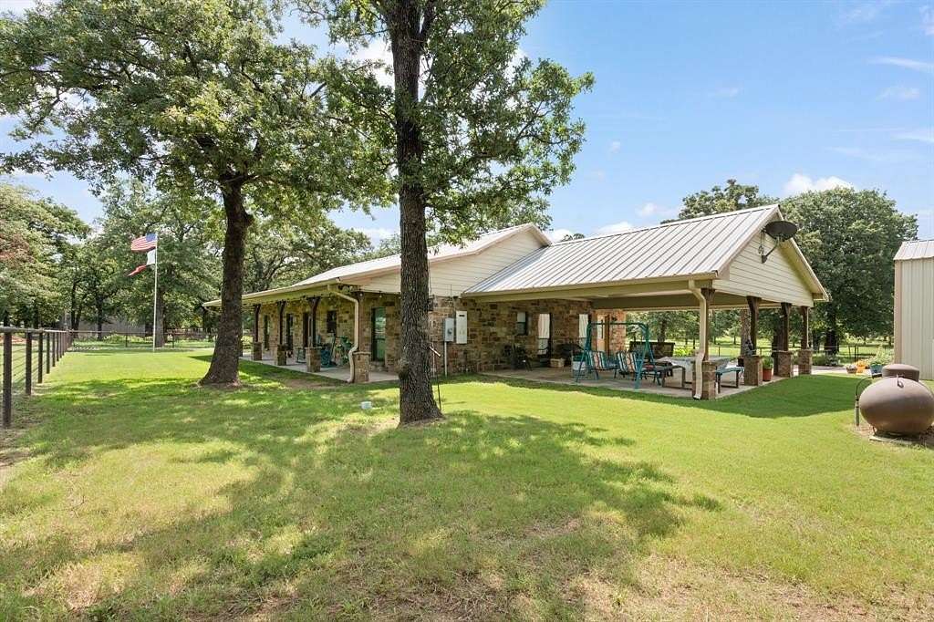 10 Acres of Land with Home for Sale in Covington, Texas