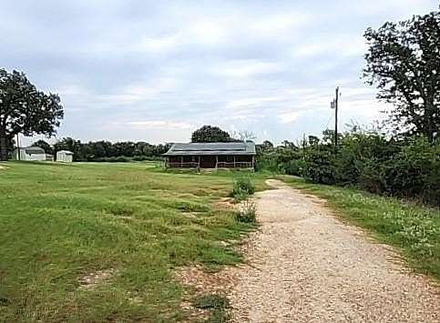1.5 Acres of Residential Land with Home for Sale in Cleburne, Texas