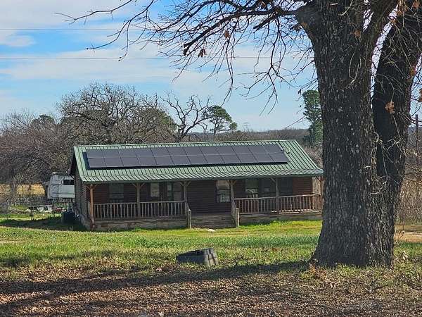 1.5 Acres of Residential Land with Home for Sale in Cleburne, Texas