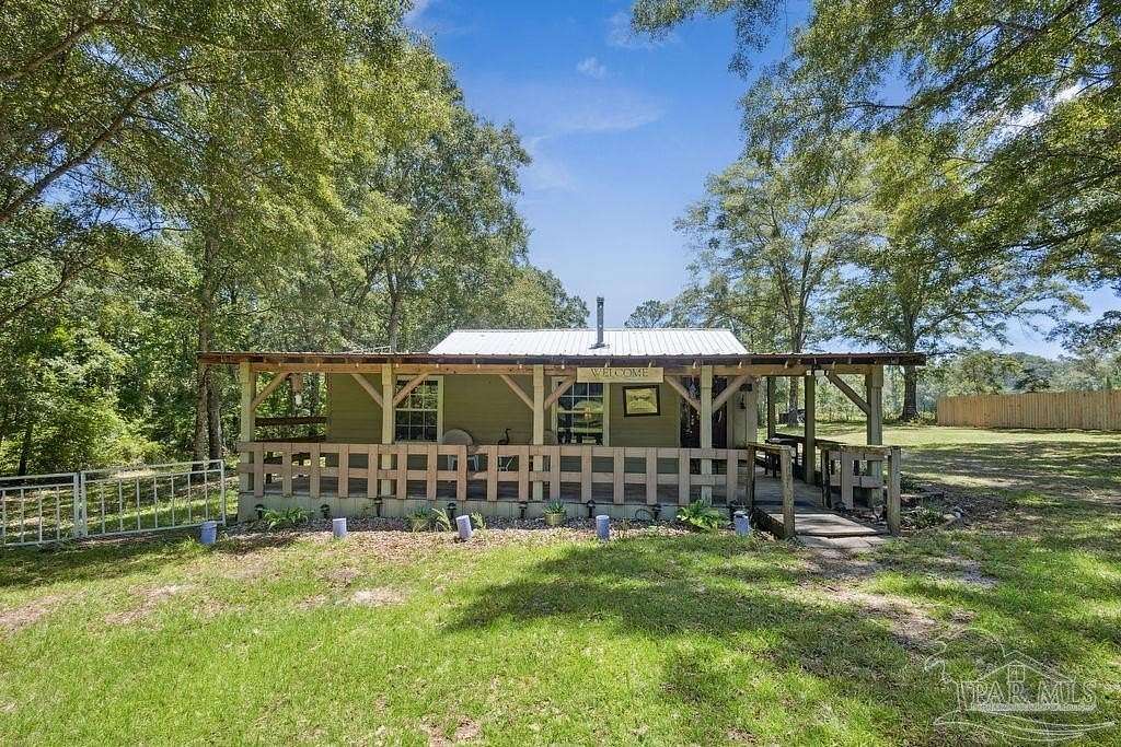 4.46 Acres of Land with Home for Sale in Jay, Florida