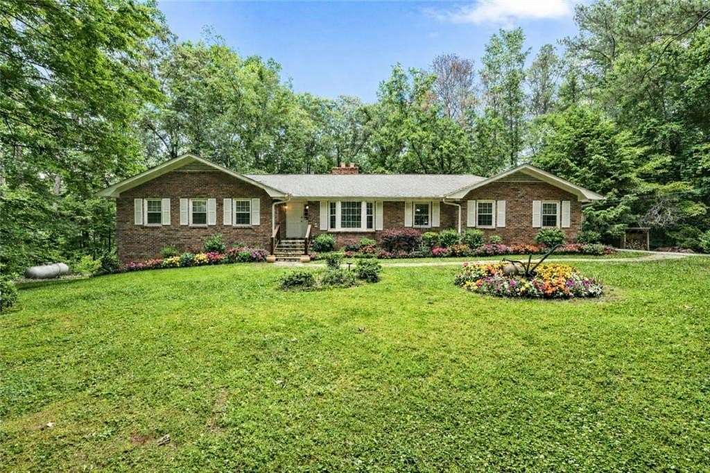 5.6 Acres of Land with Home for Sale in Powder Springs, Georgia