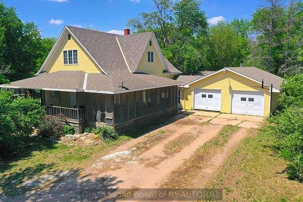 3.59 Acres of Residential Land with Home for Sale in Harvard, Nebraska
