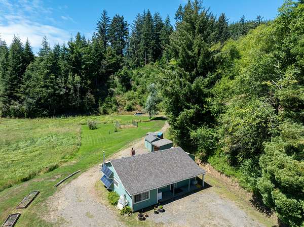 36.5 Acres of Recreational Land with Home for Sale in Toledo, Oregon
