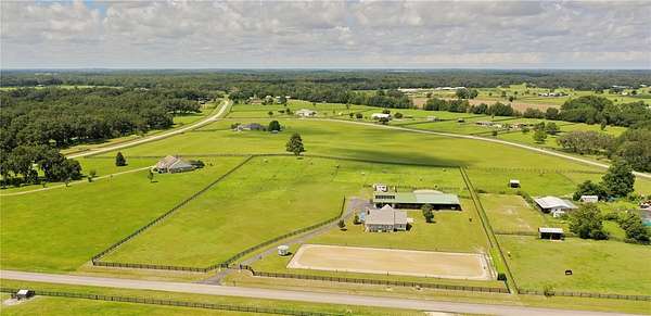 6.33 Acres of Land with Home for Sale in Morriston, Florida