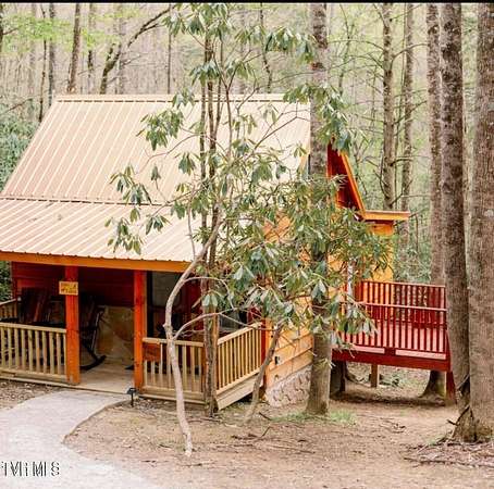 23.6 Acres of Land with Home for Sale in Roan Mountain, Tennessee