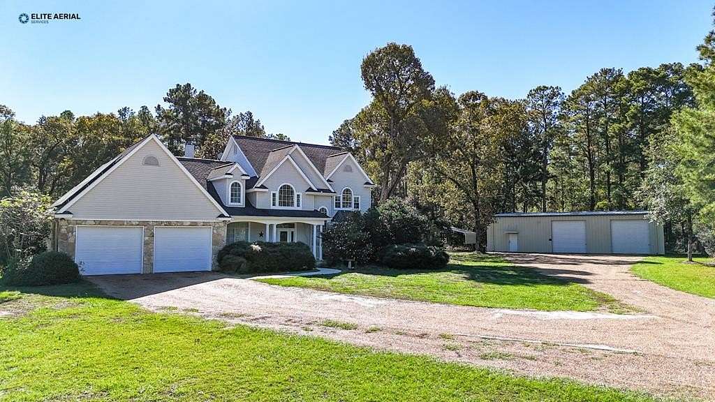 11.9 Acres of Land with Home for Sale in Brookeland, Texas