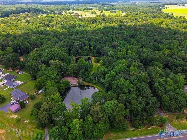 9.6 Acres of Residential Land with Home for Sale in Hartselle, Alabama
