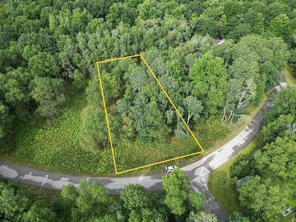 0.99 Acres of Land for Sale in Canadian Lakes, Michigan