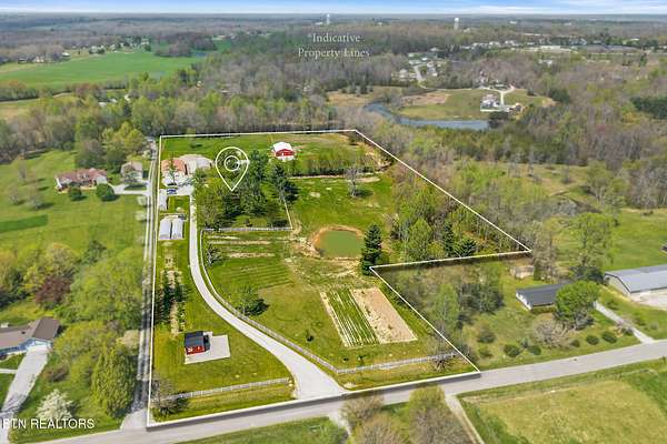 11.1 Acres of Land with Home for Sale in Crossville, Tennessee