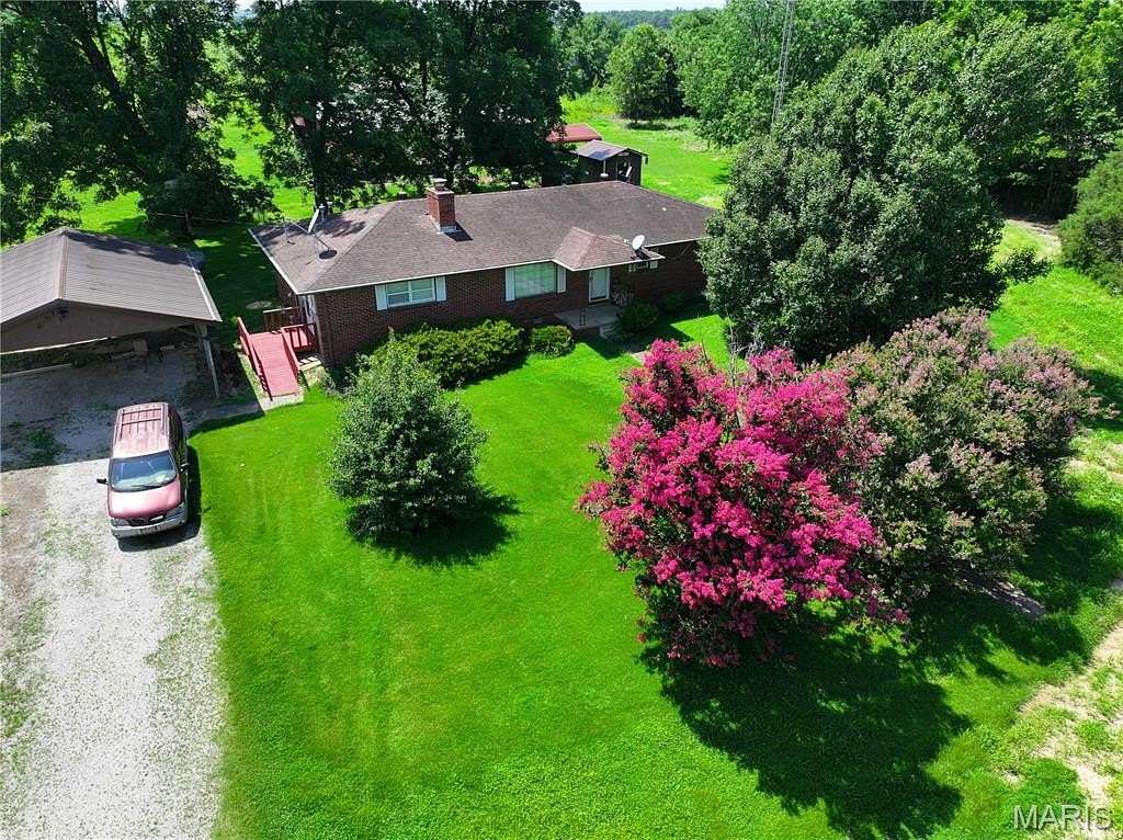 100 Acres of Agricultural Land with Home for Sale in Fisk, Missouri