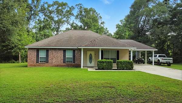 1.55 Acres of Residential Land with Home for Sale in Carriere, Mississippi