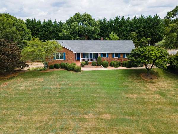 12.4 Acres of Land with Home for Sale in Landrum, South Carolina