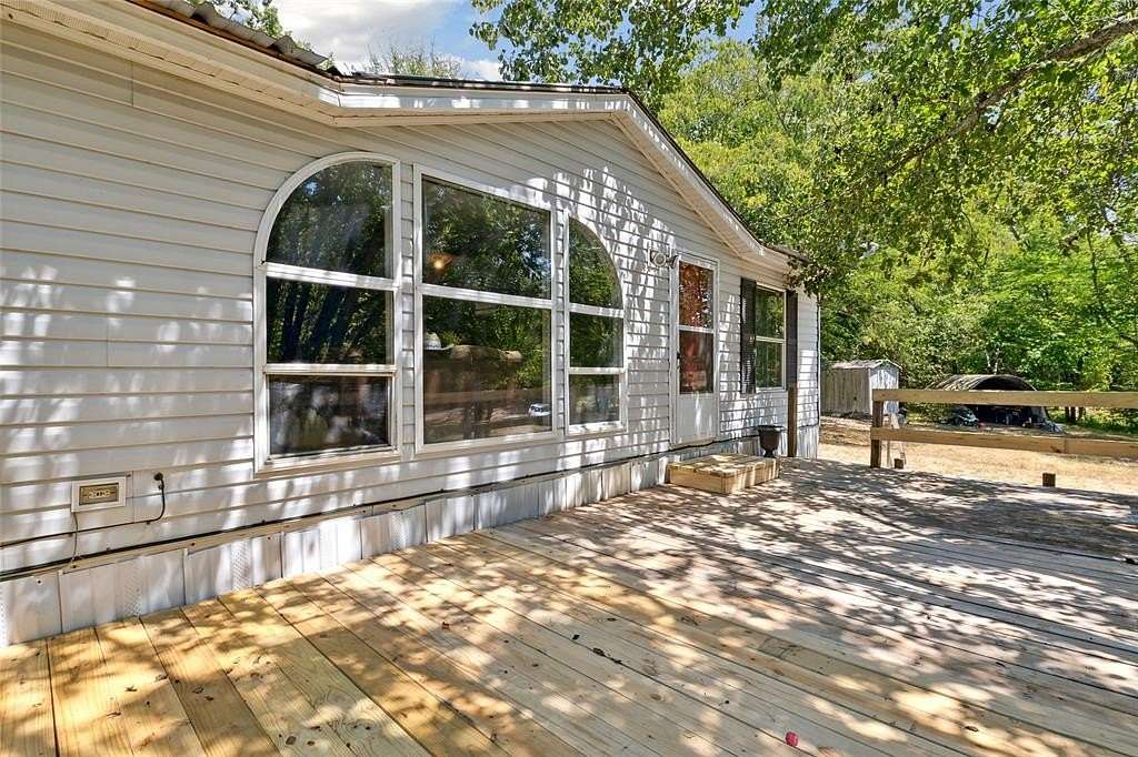 1.83 Acres of Residential Land with Home for Sale in Yantis, Texas