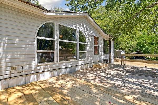 1.83 Acres of Residential Land with Home for Sale in Yantis, Texas