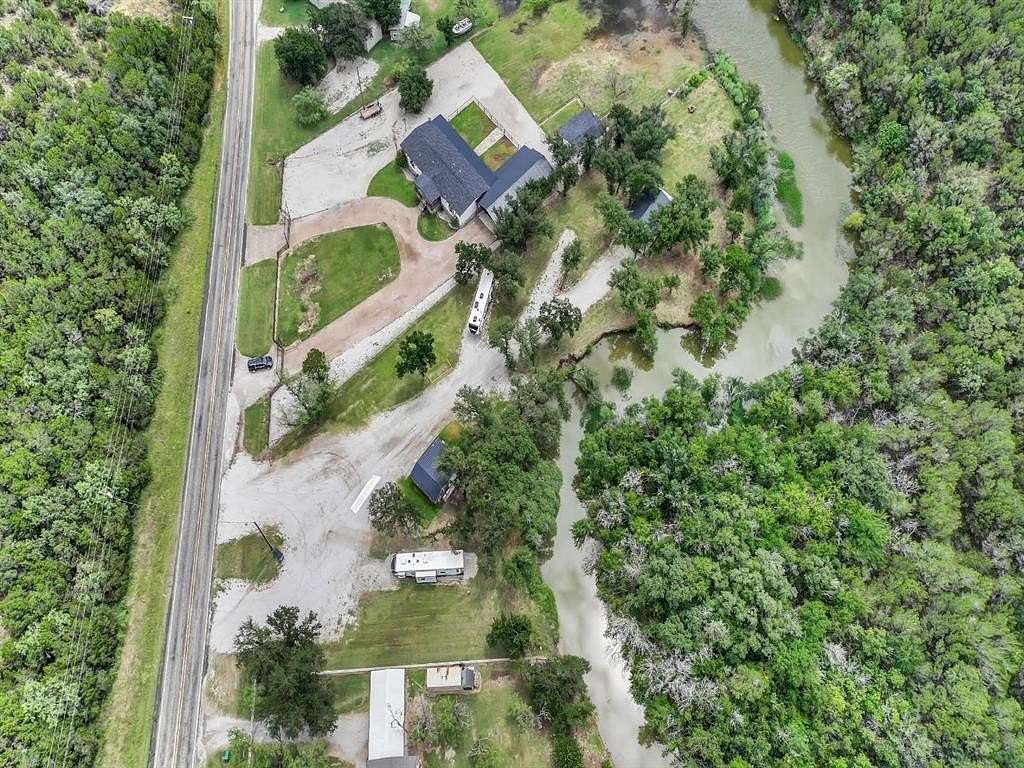 1.28 Acres of Residential Land with Home for Sale in Graham, Texas