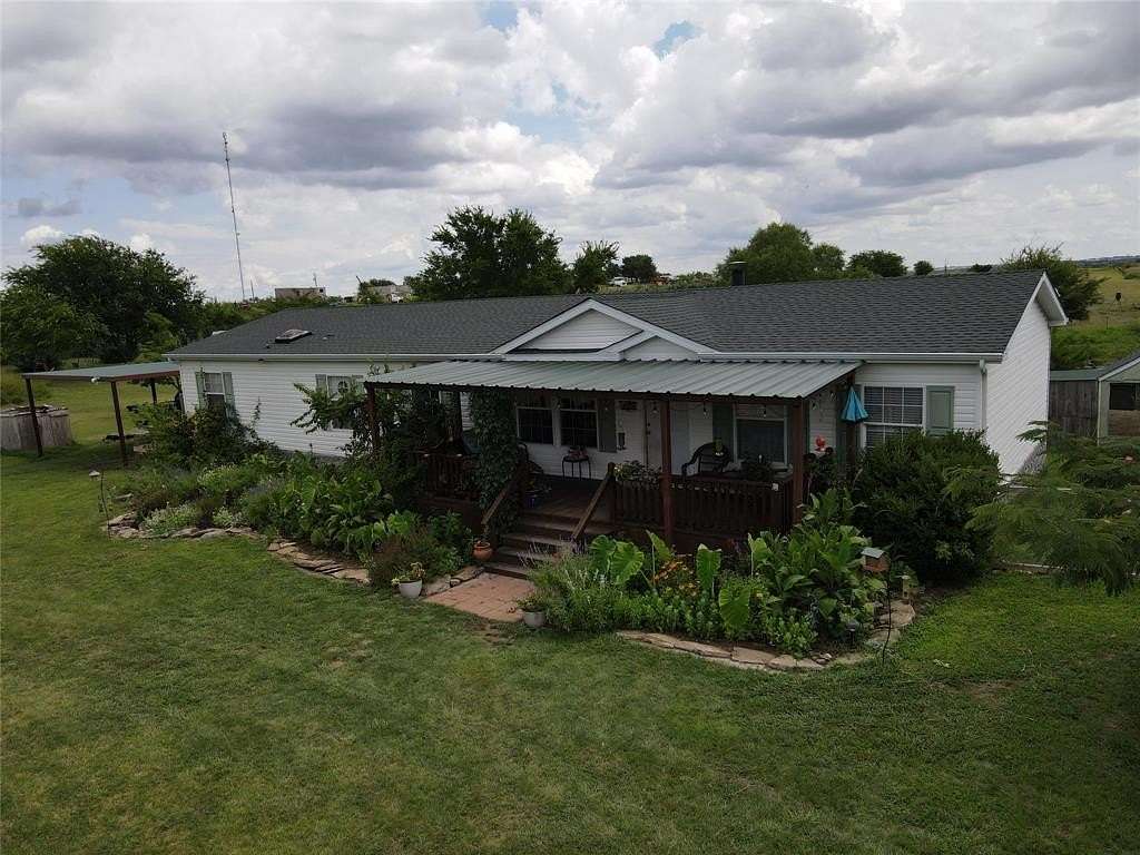 8 Acres of Land with Home for Sale in Decatur, Texas