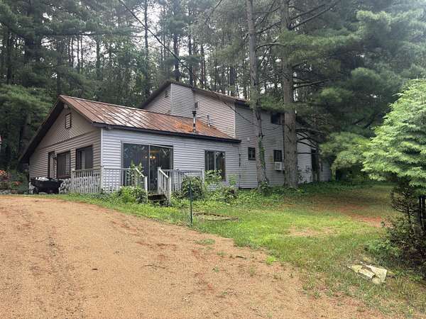 4.1 Acres of Residential Land with Home for Sale in Delton, Michigan