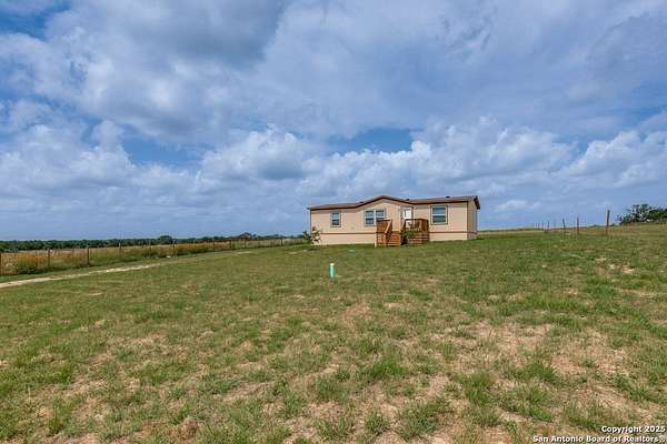 1.52 Acres of Residential Land with Home for Sale in Von Ormy, Texas