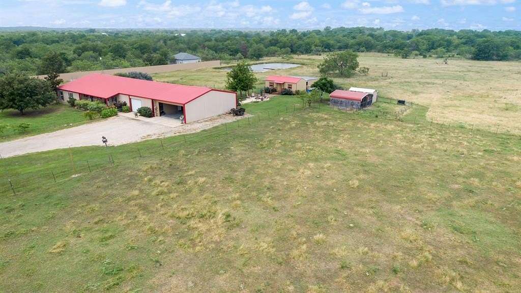 8.43 Acres of Residential Land with Home for Sale in Scurry, Texas