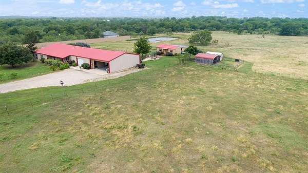 8.43 Acres of Residential Land with Home for Sale in Scurry, Texas