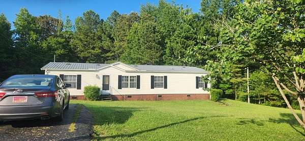 2 Acres of Residential Land with Home for Sale in Cedar Grove, Tennessee