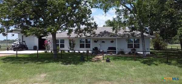 10 Acres of Land with Home for Sale in Yoakum, Texas